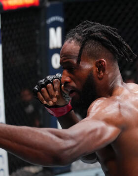 Neil Magny punches Phil Rowe in their welterweight fight during the UFC Fight Night event at Vystar Veterans Memorial Arena on June 24, 2023 in Jacksonville, Florida. (Photo by Josh Hedges/Zuffa LLC)