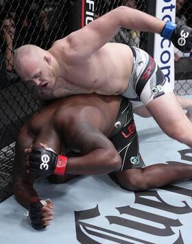 Serghei Spivac punches Derrick Lewis in a heavyweight fight during the UFC Fight Night event at UFC APEX on February 04, 2023 in Las Vegas, Nevada. (Photo by Jeff Bottari/Zuffa LLC)