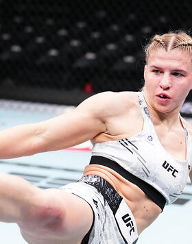 Miranda Maverick kicks Andrea Lee in a flyweight fight during the UFC 298 event at Honda Center on February 17, 2024 in Anaheim, California. (Photo by Chris Unger/Zuffa LLC)