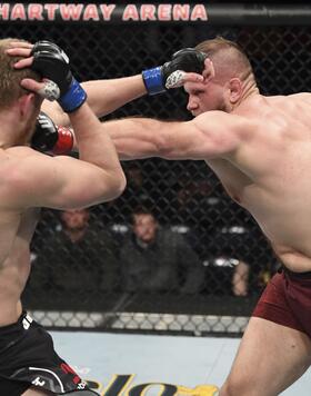 Marcin Tybura punches Serghei Spivac in their heavyweight bout during the UFC Fight Night event at Chartway Arena on February 29, 2020 in Norfolk, Virginia. (Photo by Josh Hedges/Zuffa LLC)