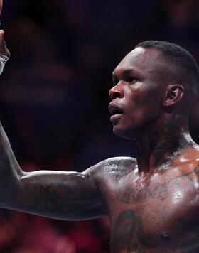 Israel Adesanya reacts after knocking out Alex Pereira in the UFC middleweight championship fight during the UFC 287 event at Kaseya Center on April 08, 2023 in Miami, Florida. (Photo by Cooper Neill/Zuffa LLC)