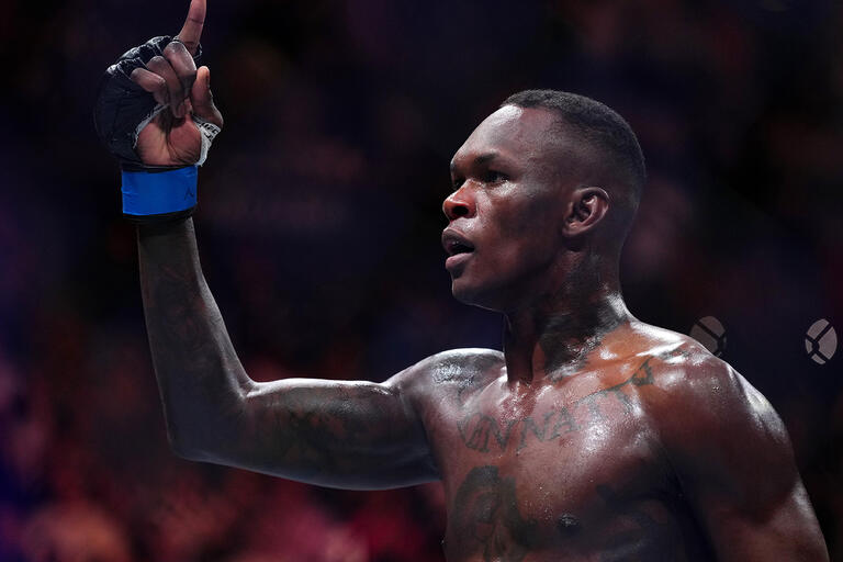 Israel Adesanya reacts after knocking out Alex Pereira in the UFC middleweight championship fight during the UFC 287 event at Kaseya Center on April 08, 2023 in Miami, Florida. (Photo by Cooper Neill/Zuffa LLC)