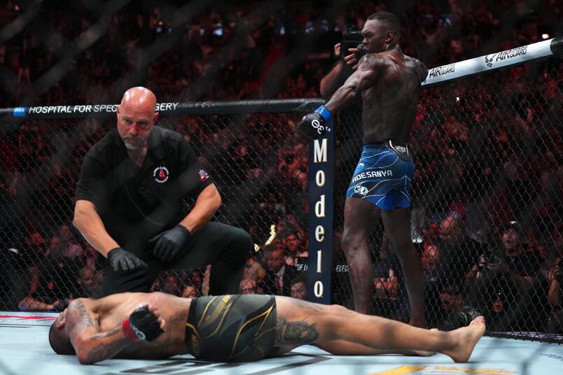 Israel Adesanya reacts after knocking out Alex Pereira in the UFC middleweight championship fight during the UFC 287 event at Kaseya Center on April 08, 2023 in Miami, Florida. (Photo by Cooper Neill/Zuffa LLC)