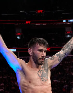 Matheus Nicolau of Brazil reacts after his TKO victory over Matt Schnell in a flyweight fight during the UFC Fight Night event at Amway Center on December 03, 2022 in Orlando, Florida. (Photo by Jeff Bottari/Zuffa LLC)