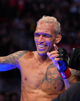 Charles Oliveira reacts after defeating Michael Chandler in their UFC lightweight championship bout at Toyota Center on May 15, 2021 in Houston, Texas. (Photo by Josh Hedges/Zuffa LLC)