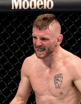 Tim Elliott battles Tagir Ulanbekov of Russia in their flyweight fight during the UFC 272 event on March 05, 2022 in Las Vegas, Nevada. (Photo by Jeff Bottari/Zuffa LLC)