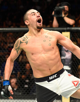 Robert Whittaker of New Zealand celebrates his TKO victory over Jacare Souza of Brazil in their middleweight fight during the UFC Fight Night event at Sprint Center on April 15, 2017 in Kansas City, Missouri. (Photo by Josh Hedges/Zuffa LLC)