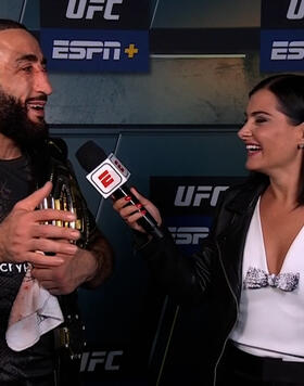 Welterweight Champion Belal Muhammad Reacts With Megan Olivi After His Title Winning Performance Against Leon Edwards At UFC 304 In Manchester On July 27, 2024