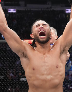 Kyler Phillips reacts after defeating Marcelo Rojo of Mexico in their bantamweight fight during the UFC 271 event at Toyota Center on February 12, 2022 in Houston, Texas. (Photo by Josh Hedges/Zuffa LLC)