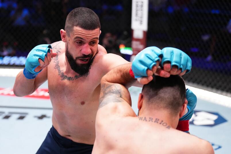 Bruno Lopes punches Mikheil Sazhiniani in a light heavyweight fight during Dana White's Contender Series season eight, week one on August 13, 2024 in Las Vegas, Nevada. (Photo by Chris Unger/Zuffa LLC)