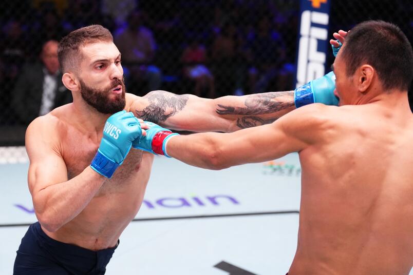 Rami Hamed punches Ding Meng in a welterweight fight during Dana White's Contender Series season eight, week one on August 13, 2024 in Las Vegas, Nevada. (Photo by Chris Unger/Zuffa LLC)