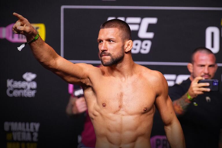 Mateusz Gamrot of Poland poses on the scale during the UFC 299 ceremonial weigh-in at Kaseya Center on March 08, 2024 in Miami, Florida. (Photo by Chris Unger/Zuffa LLC via Getty Images)