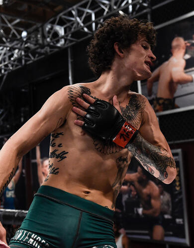 Sean O'Malley celebrates his knockout victory over Alfred Khashakyan in their bantamweight bout during Dana White's Tuesday Night Contender Series at the TUF Gym on July 18, 2017