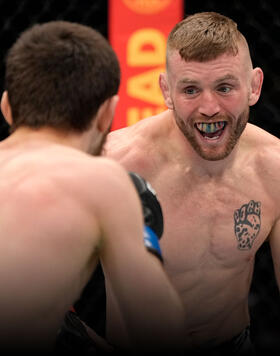 Tim Elliott battles Tagir Ulanbekov of Russia in their flyweight fight during the UFC 272 event on March 05, 2022 in Las Vegas, Nevada. (Photo by Jeff Bottari/Zuffa LLC)