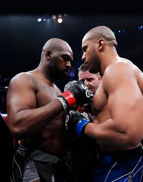 Jon Jones and Ciryl Gane of France touch gloves inside the Octagon in the UFC heavyweight championship fight during the UFC 285 event at T-Mobile Arena on March 04, 2023 in Las Vegas, Nevada. (Photo by Jeff Bottari/Zuffa LLC)