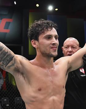 Claudio Puelles of Peru reacts after his victory over Jordan Leavitt in a lightweight fight during the UFC Fight Night event at UFC APEX