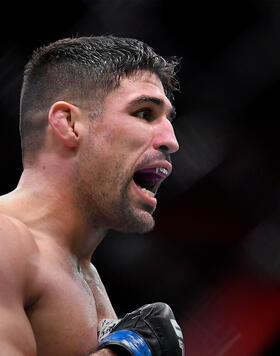 Vicente Luque reacts after his victory over Tyron Woodley in their welterweight fight during the UFC 260 event at UFC APEX on March 27, 2021 in Las Vegas, Nevada. (Photo by Chris Unger/Zuffa LLC)