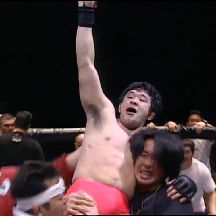 Kazushi Sakuraba celebrates a victory over Marcus Silveira at UFC Japan on December 21, 1997