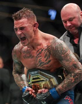 UFC President Dana White places the interim lightweight championship belt on Dustin Poirier after defeating Max Holloway in their interim lightweight championship bout during the UFC 236 event at State Farm Arena on April 13, 2019 in Atlanta, Georgia. (Photo by Carmen Mandato/Zuffa LLC via Getty Images)