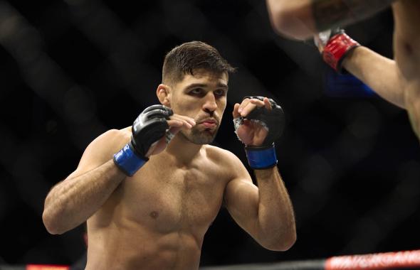 Vicente Luque of Brazil faces Michael Chiesa in their welterweight bout during the UFC 265 event at Toyota Center on August 07, 2021 in Houston, Texas. (Photo by Cooper Neill/Zuffa LLC)