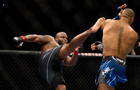 Derrick Lewis kicks Ciryl Gane of France in their interim heavyweight title bout during the UFC 265 event at Toyota Center on August 07, 2021 in Houston, Texas. (Photo by Cooper Neill/Zuffa LLC)