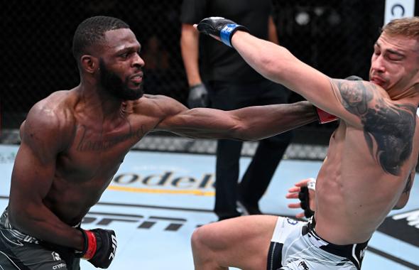 Montel Jackson punches JP Buys of South Africa in a bantamweight fight during the UFC Fight Night event at UFC APEX on September 18, 2021 in Las Vegas, Nevada. (Photo by Jeff Bottari/Zuffa LLC)