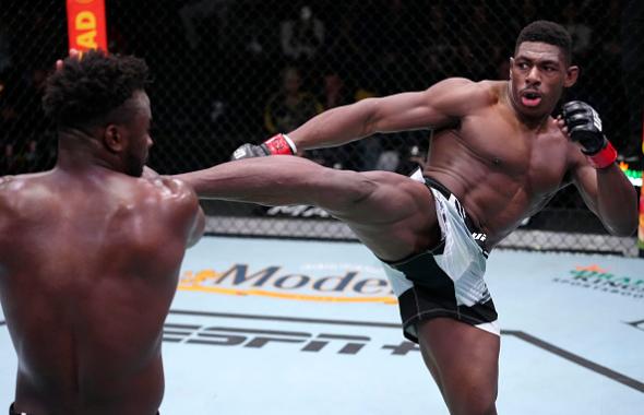 Joaquin Buckley kicks Abdul Razak Alhassan in their featherweight fight during the UFC Fight Night event at UFC APEX on February 19, 2022 in Las Vegas, Nevada. (Photo by Jeff Bottari/Zuffa LLC)