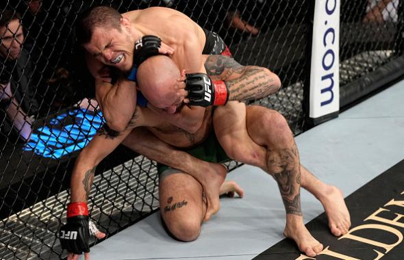 Umar Nurmagomedov of Russia secures a rear choke against Brian Kelleher in their featherweight fight during the UFC 272 event on March 05, 2022 in Las Vegas, Nevada. (Photo by Jeff Bottari/Zuffa LLC)