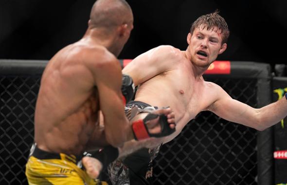 Bryce Mitchell kicks Edson Barboza of Brazil in their featherweight fight during the UFC 272 event on March 05, 2022 in Las Vegas, Nevada. (Photo by Chris Unger/Zuffa LLC)