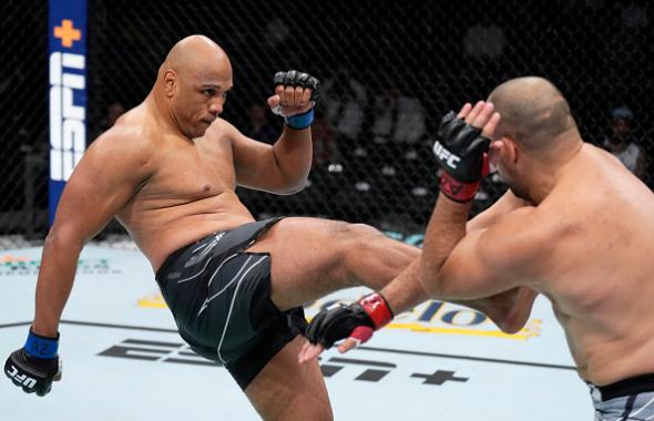 Marcos Rogerio de Lima of Brazil kicks Blagoy Ivanov of Bulgaria in a heavyweight fight during the UFC 274 event at Footprint Center on May 07, 2022 in Phoenix, Arizona. (Photo by Chris Unger/Zuffa LLC)