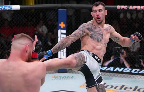 Aleksandar Rakic of Austria kicks Jan Blachowicz of Poland in a light heavyweight fight during the UFC Fight Night event at UFC APEX on May 14, 2022 in Las Vegas, Nevada. (Photo by Jeff Bottari/Zuffa LLC)