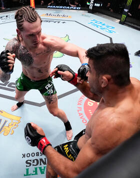 Brendan Allen punches Andre Muniz of Brazil in a middleweight fight during the UFC Fight Night event at UFC APEX on February 25, 2023 in Las Vegas, Nevada. (Photo by Chris Unger/Zuffa LLC)