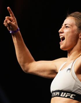 Jasmine Jasudavicius of Canada poses on the scale during the UFC 289 ceremonial weigh-in at Rogers Arena on June 09, 2023 in Vancouver, British Columbia. (Photo by Cooper Neill/Zuffa LLC via Getty Images)