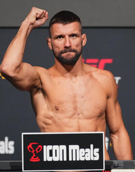 Mateusz Gamrot of Poland poses on the scale during the UFC Fight Night weigh-in at UFC APEX on September 22, 2023 in Las Vegas, Nevada. (Photo by Jeff Bottari/Zuffa LLC)