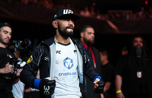 Deiveson Figueiredo of Brazil walks to the Octagon before his bantamweight fight against Rob Font during the UFC Fight Night event at Moody Center on December 02, 2023 in Austin, Texas. (Photo by Cooper Neill/Zuffa LLC)