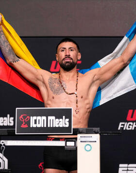 Chris Gutierrez poses on the scale during the UFC Fight Night weigh-in at UFC APEX on December 08, 2023 in Las Vegas, Nevada. (Photo by Jeff Bottari/Zuffa LLC)