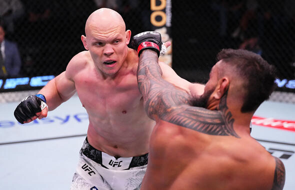 Bogdan Guskov of Uzbekistan punches Zac Pauga in a light heavyweight fight during the UFC Fight Night event at UFC APEX on February 10, 2024 in Las Vegas, Nevada. (Photo by Jeff Bottari/Zuffa LLC)