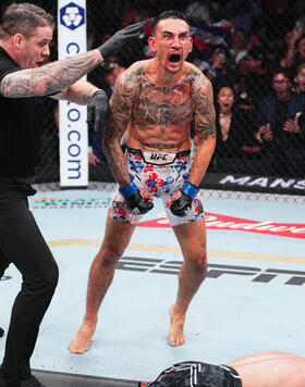 Max Holloway reacts to the knockout of Justin Gaethje in the BMF championship fight during the UFC 300 event at T-Mobile Arena on April 13, 2024 in Las Vegas, Nevada. (Photo by Jeff Bottari/Zuffa LLC)