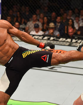 Edson Barboza of Brazil kicks Paul Felder in their lightweight bout during the UFC event at the United Center on July 25, 2015 in Chicago, Illinois. (Photo by Jeff Bottari/Zuffa LLC/Zuffa LLC)