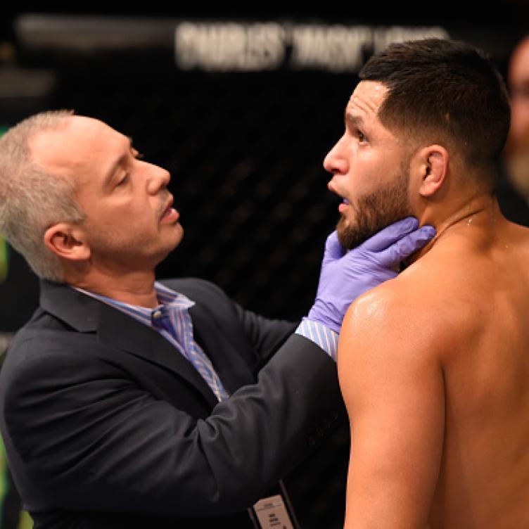 A doctor tends to Jorge Masvidal after he is poked in the eye during the UFC Fight Night event inside the Mandalay Bay Events Center on May 29, 2016 in Las Vegas, Nevada. (Photo by Josh Hedges/Zuffa LLC)