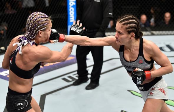 Karolina Kowalkiewicz of Poland punches Felice Herrig in their women's strawweight bout during the UFC 223 event inside Barclays Center on April 7, 2018 in Brooklyn, New York. (Photo by Jeff Bottari/Zuffa LLC)